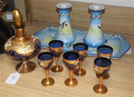 A Venetian-style gilded and enamelled blue glass seven piece liqueur set and a ceramic part dressing table set